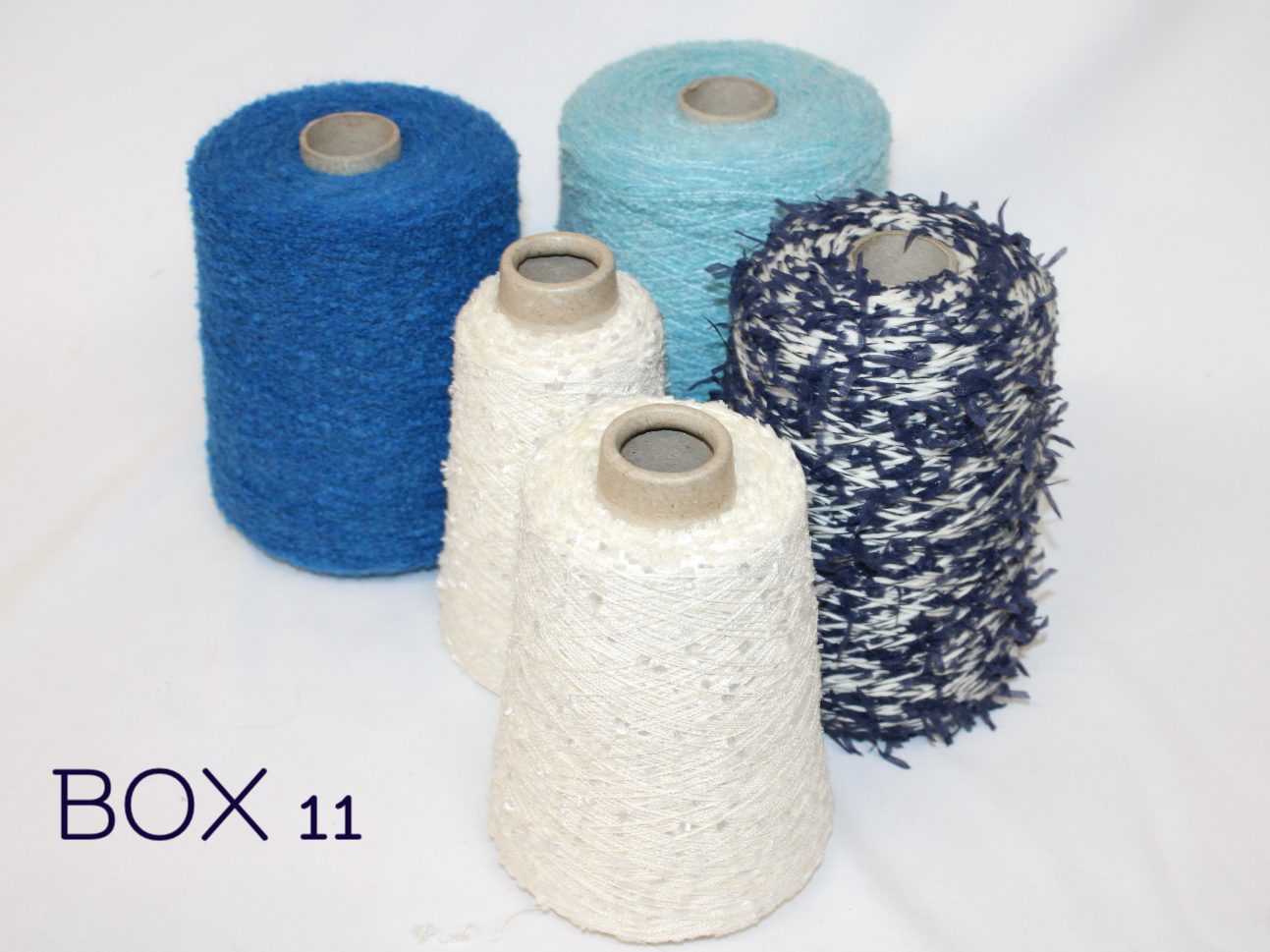 BOXES OF STOCK YARNS FOR CLOTHING
