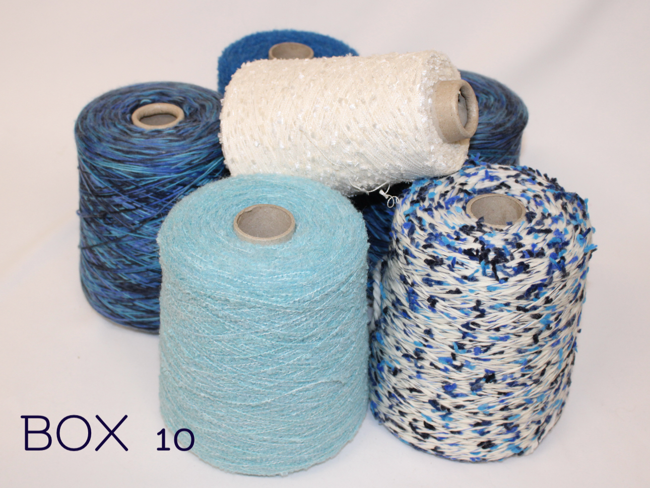 BOXES OF STOCK YARNS FOR CLOTHING